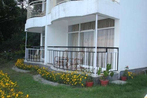 Zahrada ubytování The Cliff Resort, Munnar