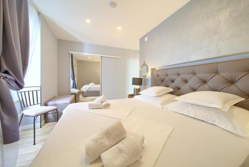 Katil atau katil-katil dalam bilik di Apartment Old Town Mariolina