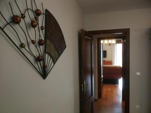 Ένα ή περισσότερα κρεβάτια σε δωμάτιο στο Apartamentos Casa Aneta