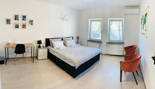 Кровать или кровати в номере Lina Rooms Hostel