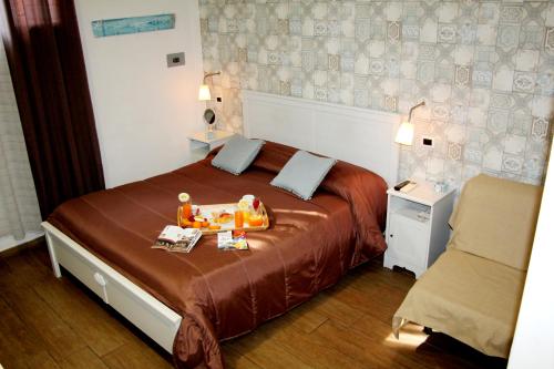 Giường trong phòng chung tại B&B Dolcevita