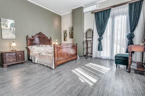Postel nebo postele na pokoji v ubytování Villa Intemella