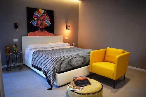 Ένα ή περισσότερα κρεβάτια σε δωμάτιο στο MaSà Appartamenti (Il Mare in Salotto)