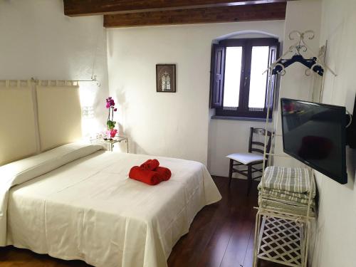 Ένα ή περισσότερα κρεβάτια σε δωμάτιο στο The Templars Guesthouse