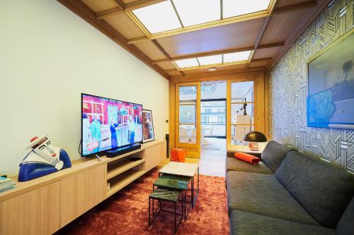 Televisyen dan/atau pusat hiburan di B&B Suites 124