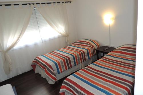 Una cama o camas en una habitación de Chivilrent