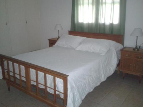 Tempat tidur dalam kamar di Casa Quinta Corrientes
