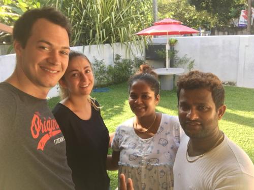 a group of three people posing for a picture at Villa N in Unawatuna
