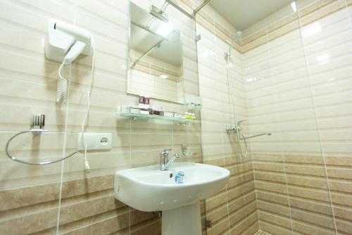 Ένα μπάνιο στο Mirzo Boutique Hotel
