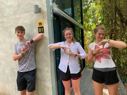 a couple of people standing outside of a building at BeachBox@Koh Сhang in Ko Chang