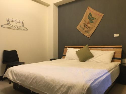 Cama o camas de una habitación en 阿鑫民宿