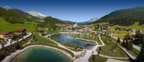 an aerial view of a village in the mountains at Landhotel Anna in Sankt Martin am Tennengebirge