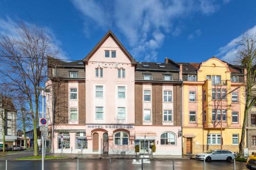 a building on the corner of a street at Trip Inn Hotel Schumann in Düsseldorf