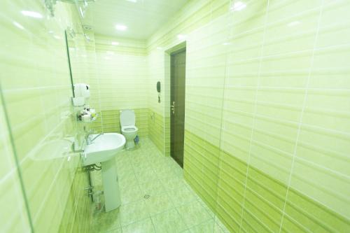 Ένα μπάνιο στο Mirzo Boutique Hotel
