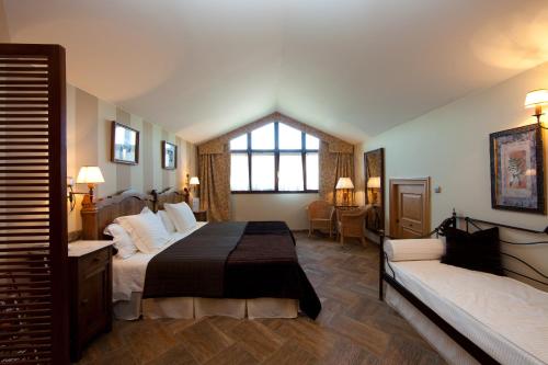 Postel nebo postele na pokoji v ubytování Hotel Katxi