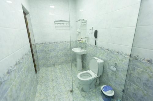 Ένα μπάνιο στο Mirzo Boutique Hotel