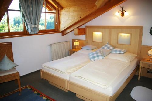 Postel nebo postele na pokoji v ubytování Haus Bergblick