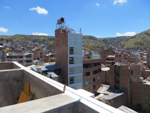 a view of a city from the roof of a building at La Casa De Yoni in Puno
