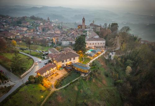 an aerial view of a town with a building on a hill at Hotel Villa Beccaris in Monforte dʼAlba
