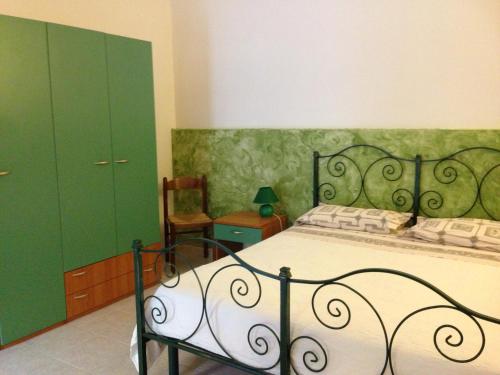Кровать или кровати в номере Agriturismo Sa Tanca Noa