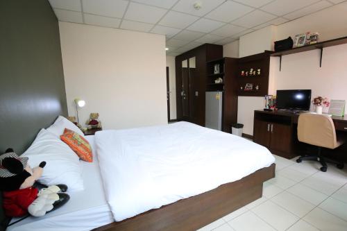 Katil atau katil-katil dalam bilik di De Junction House
