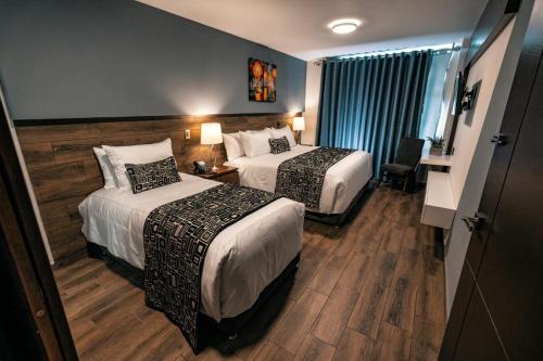 Postel nebo postele na pokoji v ubytování Hotel Corral Grande