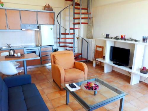 Ruang duduk di Point Twins Apartments