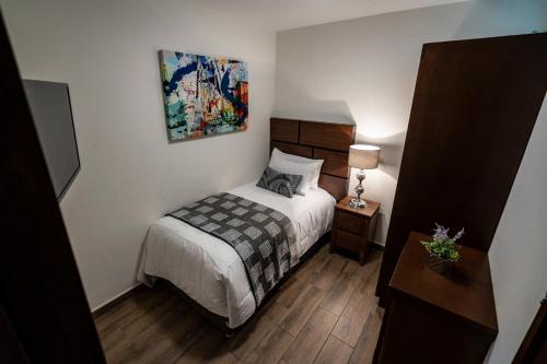 Postel nebo postele na pokoji v ubytování Hotel Corral Grande