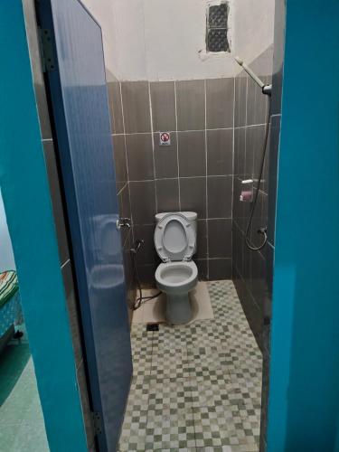 Koupelna v ubytování Mulia Homestay