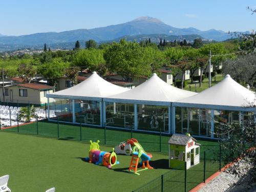 Imagen de la galería de RUSTICO PARK DELLE ROSE - Regarda Travel, en Lazise