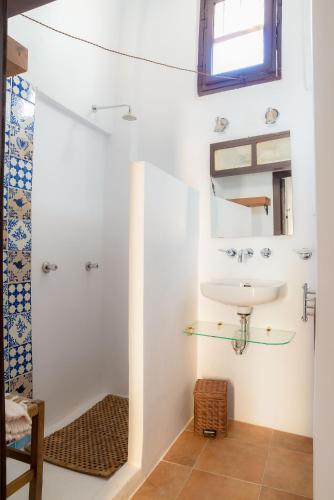 a bathroom with a sink and a shower at Bendita Casa in Granada