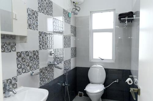 Vannituba majutusasutuses Upasana Eco Resort