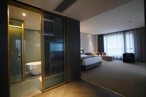 Koupelna v ubytování Hangzhou Cosy Park Hotel(Liangzhu)
