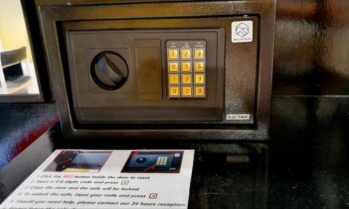 a model of a microwave oven sitting on a table at Casa Picasso Hotel - SHA Plus Certified in Bangkok