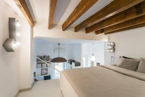 Ліжко або ліжка в номері White Loft Alicante