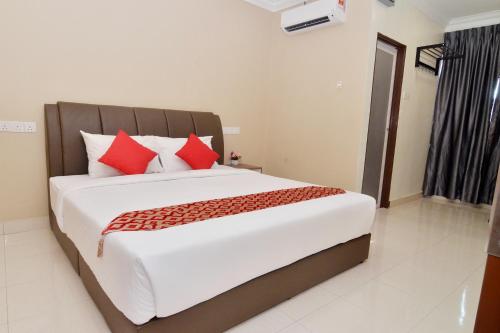 Ένα ή περισσότερα κρεβάτια σε δωμάτιο στο Hotel Raub Agro