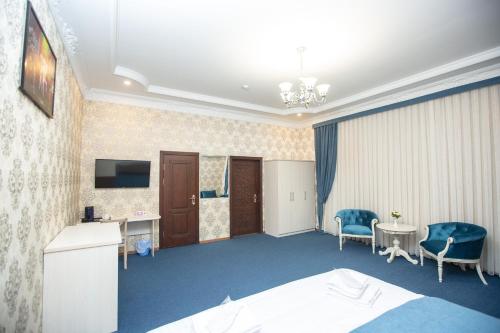 Μια τηλεόραση ή/και κέντρο ψυχαγωγίας στο Mirzo Boutique Hotel