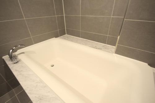 Koupelna v ubytování SOYU Hotel