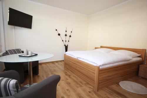Łóżko lub łóżka w pokoju w obiekcie Ferienwohnung Ballstrasse 28
