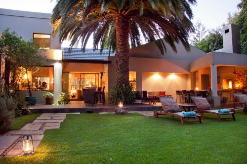 Taman di luar African Rock Hotel & Spa, a "Boutique Lifestyle Resort"