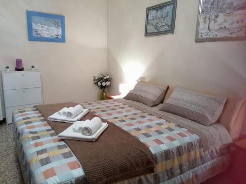 Een bed of bedden in een kamer bij La casa di nuvola