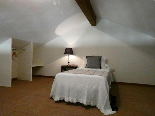 Letto o letti in una camera di Núcleo de Turismo Rural Valle de Iruelas