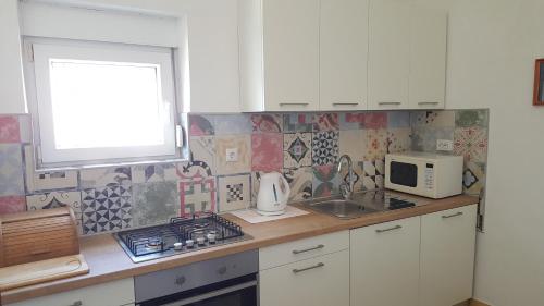 Køkken eller tekøkken på Veli Brig Apartment