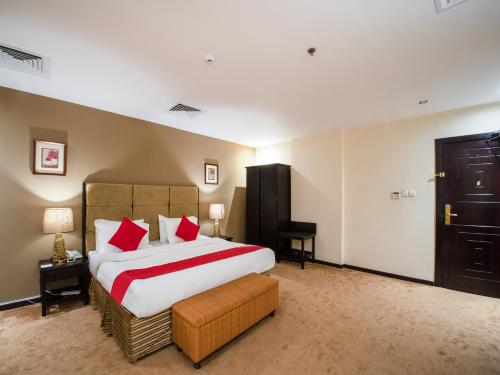 Кровать или кровати в номере ITLALA ALSHARQ FOR SERVICED APARTMENTs