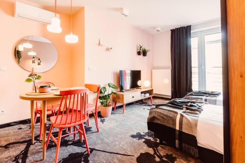 Posteľ alebo postele v izbe v ubytovaní Mosquito Silesia Apartments