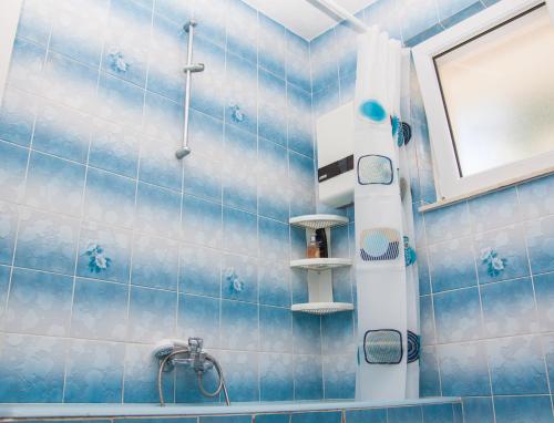 Ванна кімната в Nadalina Apartment