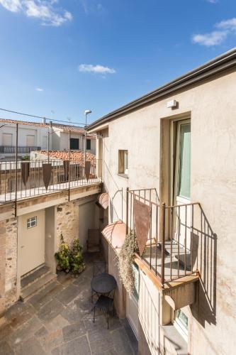 a view from the balcony of a apartment with two balconies at Il Cortiletto Hotel Maison in Tresnuraghes