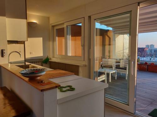 Exclusive rooftop apartment with large terrace in Solari/Tortona