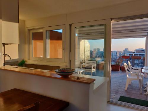 Exclusive rooftop apartment with large terrace in Solari/Tortona