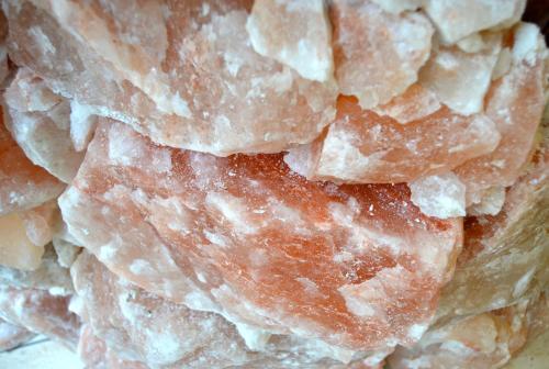 a close up of a pile of sugar covered doughnuts at Hotel Pension Fortuna in Bad Bevensen
